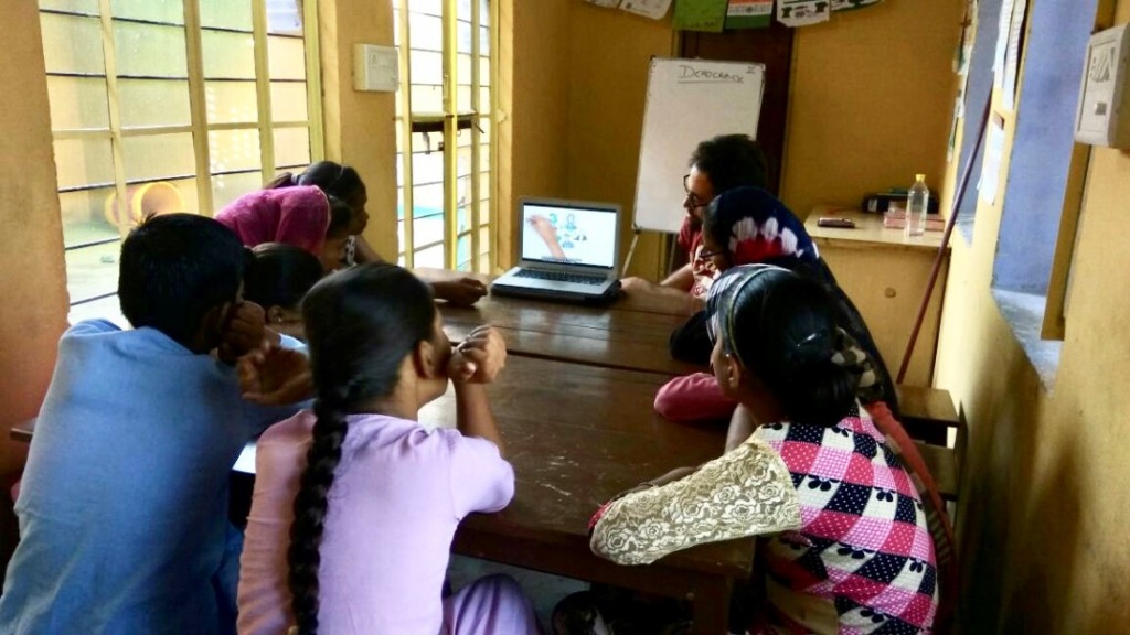 All together watching the introductory video on Democracy.